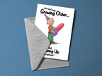 You Can't Help Growing Older But Growing Up Is Optional Card back view - funny greeting card by Perrys Prints